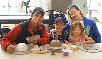 Family in Pottery Studio