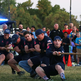 Men in a tug of war match