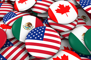 buttons imprinted with flags from America, Canada, and Mexico